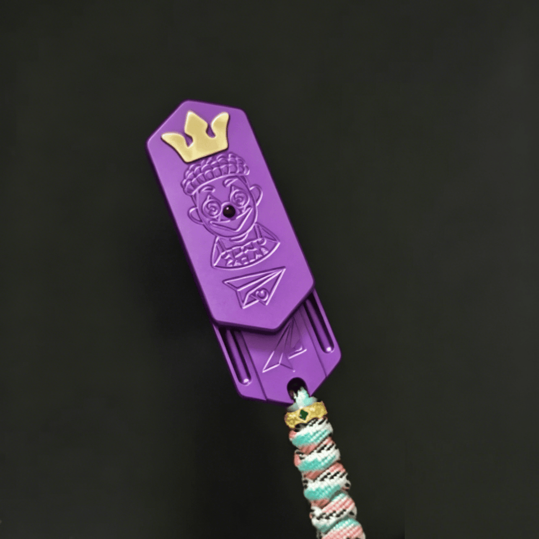 Lucky Candy Tuning Fork EDC Push Slider in purple with a king character design, perfect for fidgeting and collecting.