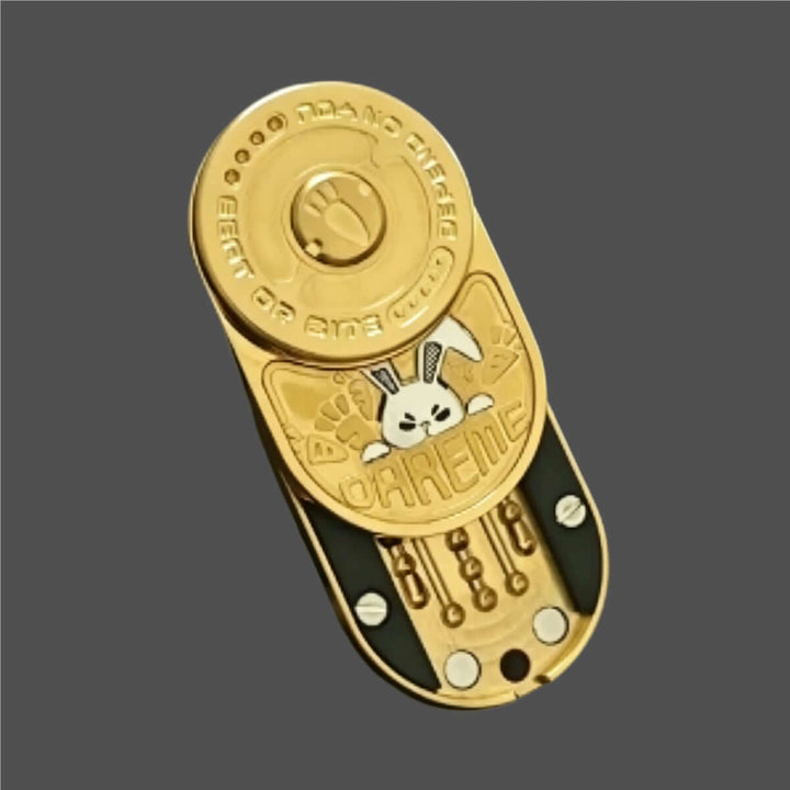 Angry Bunny Push Card in gold, a premium stainless steel EDC fidget slider with playful design and mechanical action.