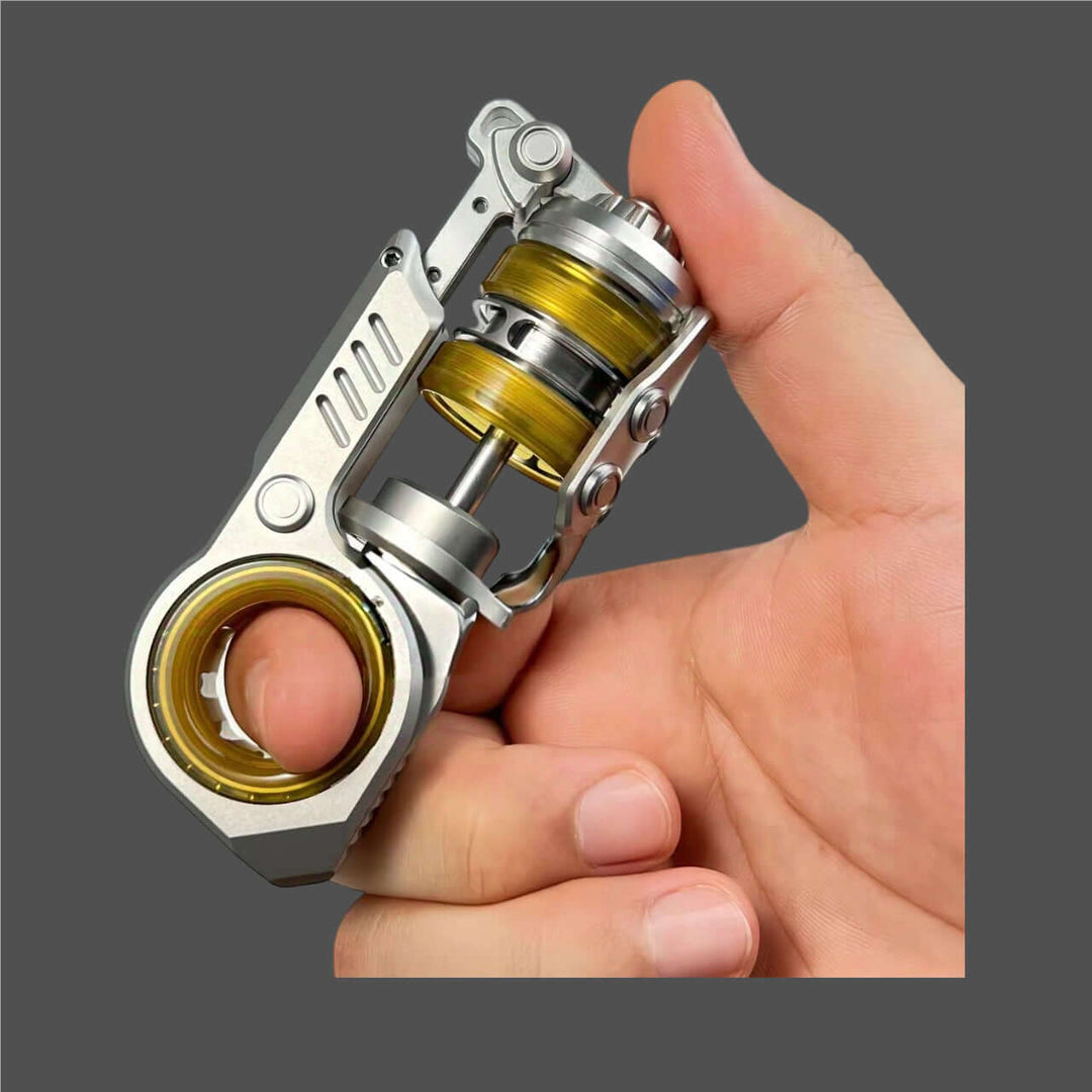 Hand holding a Swing Ball Composite Tuning Fork Ratchet EDC with stainless steel and titanium alloy features.